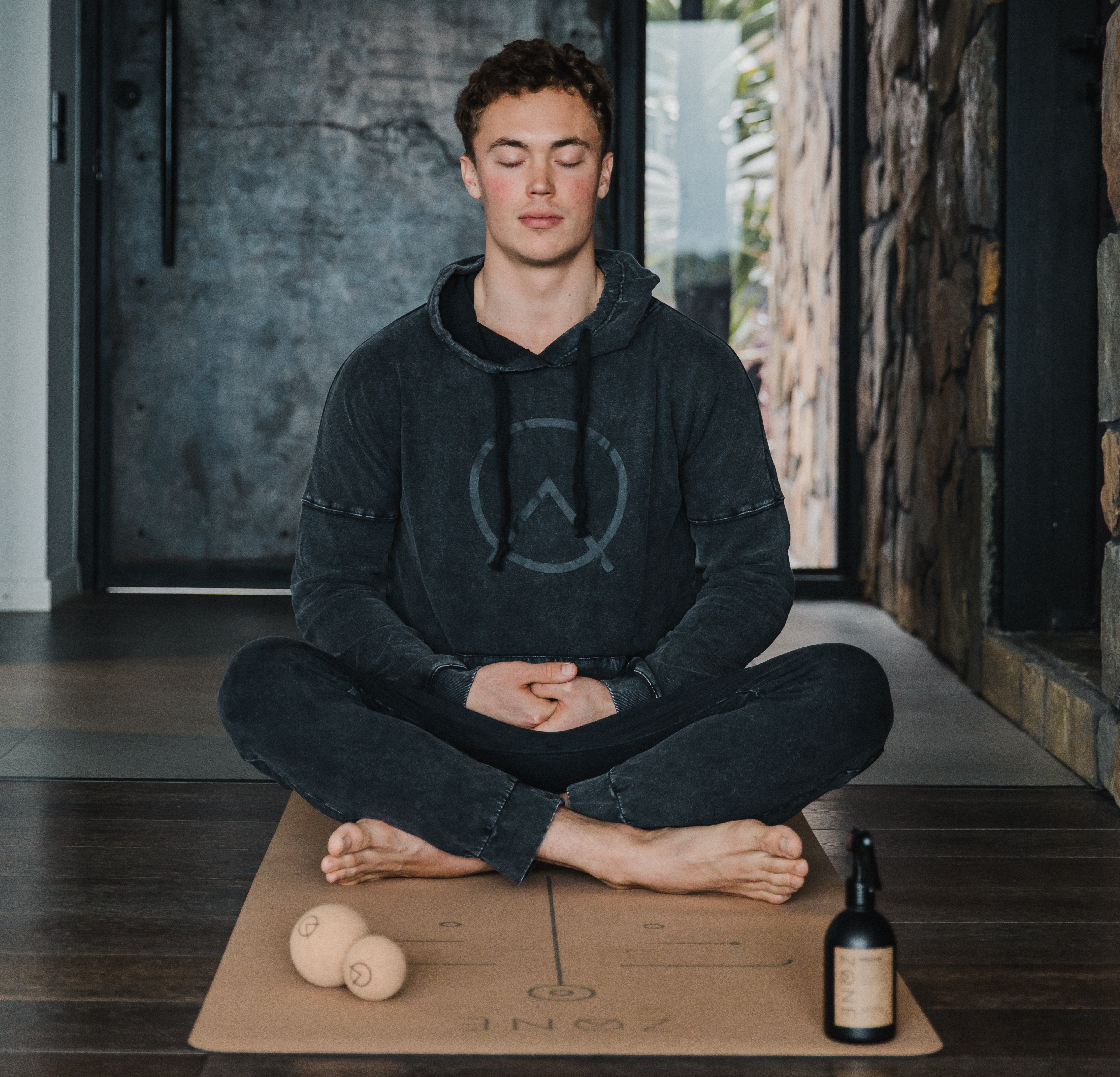 man meditating on yoga mat