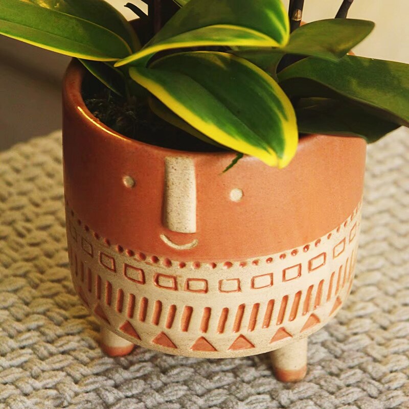 Human face ceramic flower pot